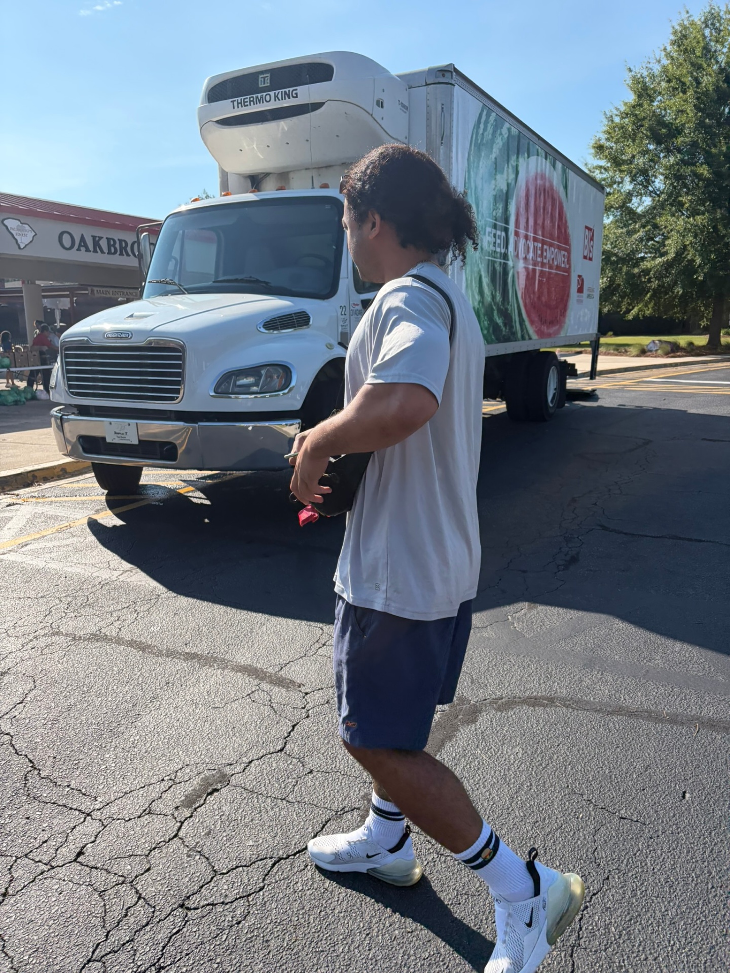 Volunteers preparing food packages at a Charleston-area distribution.